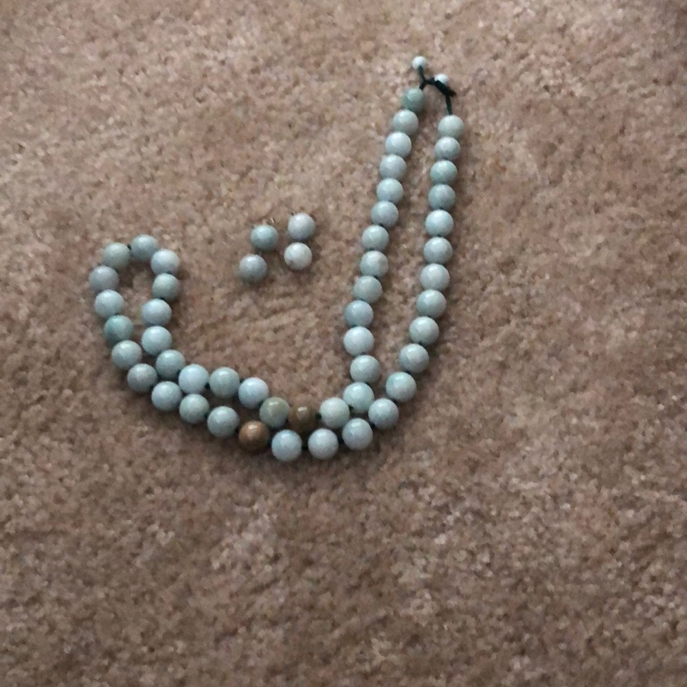 Hand knotted 10mm jade necklace and earrings.